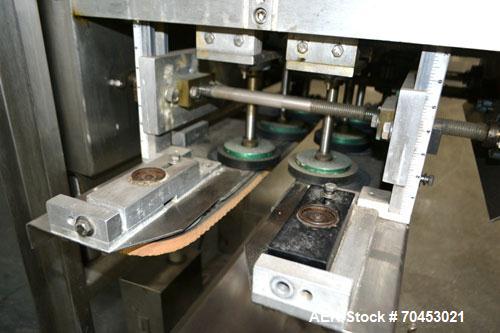 Used ELF ACT600L Automatic cap tightener. (6) Quill, rated up to 100 containers per minute. Cap size range 10mm-110mm diameter. Single belt unit C frame design. Mounted on casters. SELLING PRICE, AS ...