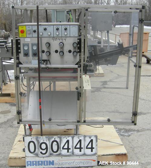Used E-Pak (ELF) Semi Automatic Six Spindle Capper. (3) sets of (2) spindles. With cap chute feeder, cabable of speeds up to 120 CPM. Has C frame design to roll up to existing conveyor line. Cap size...