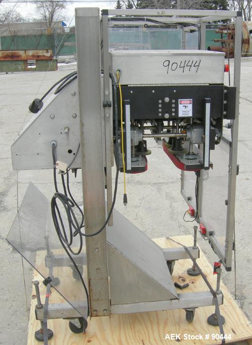 Used E-Pak (ELF) Semi Automatic Six Spindle Capper. (3) sets of (2) spindles. With cap chute feeder, cabable of speeds up to 120 CPM. Has C frame design to roll up to existing conveyor line. Cap size...