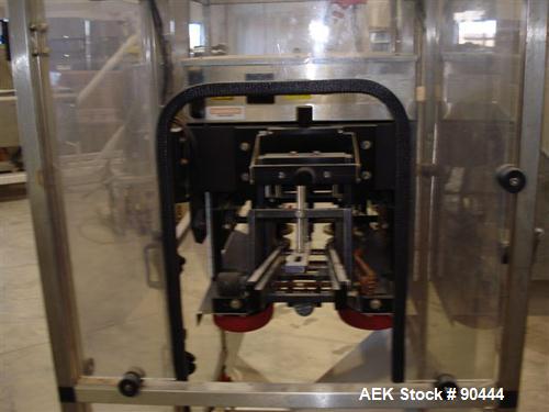 Used E-Pak (ELF) Semi Automatic Six Spindle Capper. (3) sets of (2) spindles. With cap chute feeder, cabable of speeds up to 120 CPM. Has C frame design to roll up to existing conveyor line. Cap size...