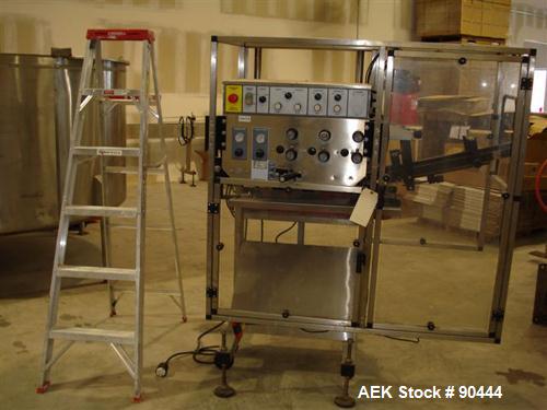 Used E-Pak (ELF) Semi Automatic Six Spindle Capper. (3) sets of (2) spindles. With cap chute feeder, cabable of speeds up to 120 CPM. Has C frame design to roll up to existing conveyor line. Cap size...