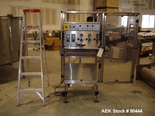 Used E-Pak (ELF) Semi Automatic Six Spindle Capper. (3) sets of (2) spindles. With cap chute feeder, cabable of speeds up to 120 CPM. Has C frame design to roll up to existing conveyor line. Cap size...