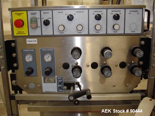 Used E-Pak (ELF) Semi Automatic Six Spindle Capper. (3) sets of (2) spindles. With cap chute feeder, cabable of speeds up to 120 CPM. Has C frame design to roll up to existing conveyor line. Cap size...