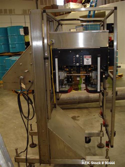 Used E-Pak (ELF) Semi Automatic Six Spindle Capper. (3) sets of (2) spindles. With cap chute feeder, cabable of speeds up to 120 CPM. Has C frame design to roll up to existing conveyor line. Cap size...