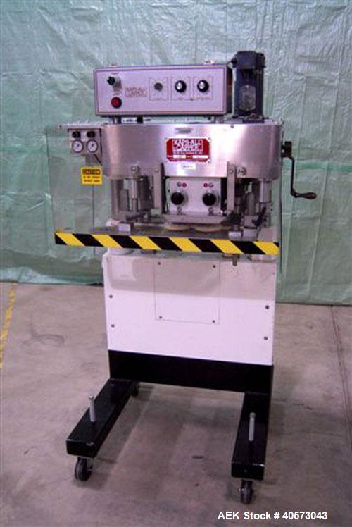 Used Kaps-All Model F4 Inline Quill Cap Tightener/Retorquer. Capable of speeds over 150 BPM. Cap size range: 13 to 70mm. Has single belt side grippers, C frame design with painted base. Last used in ...