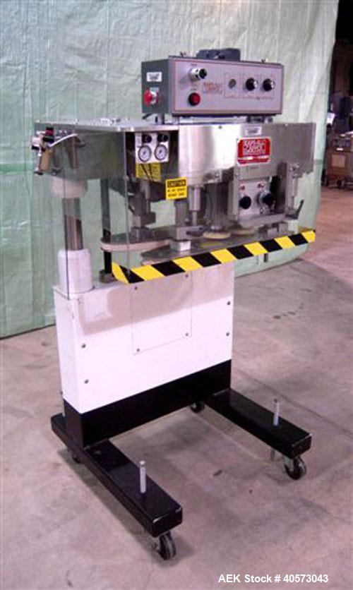 Used Kaps-All Model F4 Inline Quill Cap Tightener/Retorquer. Capable of speeds over 150 BPM. Cap size range: 13 to 70mm. Has single belt side grippers, C frame design with painted base. Last used in ...