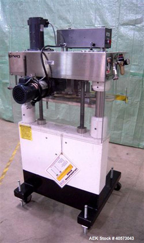 Used Kaps-All Model F4 Inline Quill Cap Tightener/Retorquer. Capable of speeds over 150 BPM. Cap size range: 13 to 70mm. Has single belt side grippers, C frame design with painted base. Last used in ...