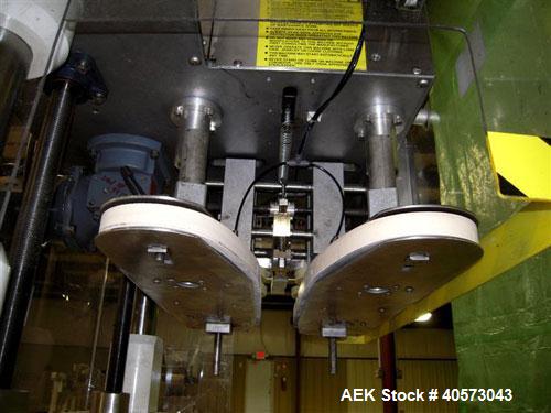 Used Kaps-All Model F4 Inline Quill Cap Tightener/Retorquer. Capable of speeds over 150 BPM. Cap size range: 13 to 70mm. Has single belt side grippers, C frame design with painted base. Last used in ...
