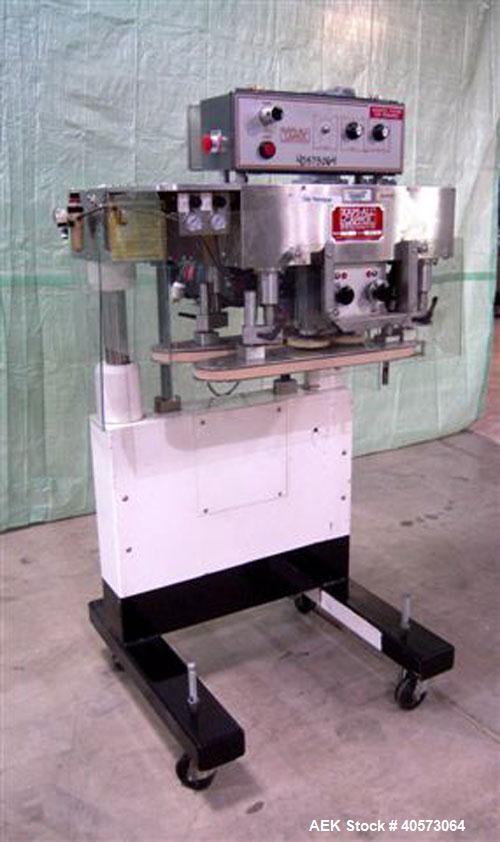 Used Kaps-All Model F4 Inline Quill Cap Tightener/Retorquer. Capable of speeds over 150 BPM. Cap size range: 13 to 70mm. Has single belt side grippers, C frame design with painted base. Last used in ...