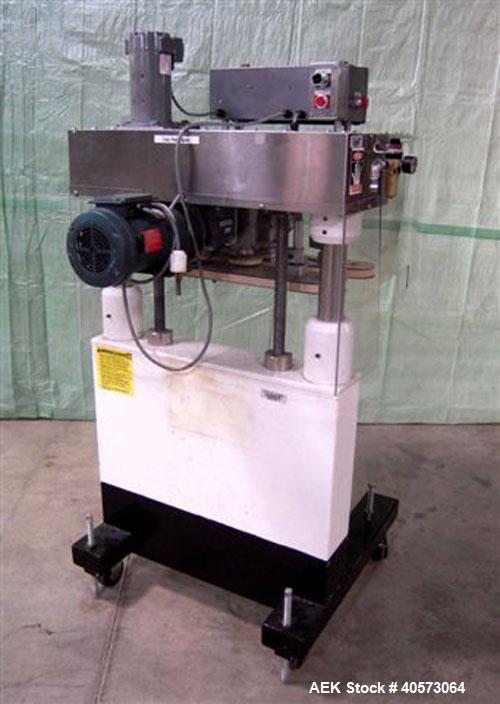 Used Kaps-All Model F4 Inline Quill Cap Tightener/Retorquer. Capable of speeds over 150 BPM. Cap size range: 13 to 70mm. Has single belt side grippers, C frame design with painted base. Last used in ...