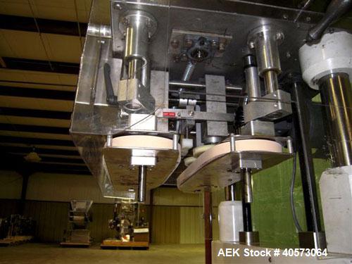 Used Kaps-All Model F4 Inline Quill Cap Tightener/Retorquer. Capable of speeds over 150 BPM. Cap size range: 13 to 70mm. Has single belt side grippers, C frame design with painted base. Last used in ...