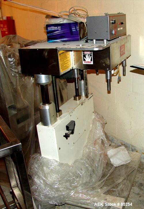 Used Kaps all Model BC Bottle Carrier/Transporter. 3/4 hp drive motor, serial #3812. Used for gap transporting between conveyors, depucking containers, bottom coding. Can handle vials to gallons with...