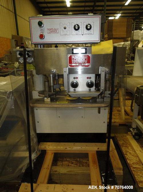 Used Kaps-All Model F4 Inline Quill Cap Tightener or Retorquer capable of speeds over 150 BPM. Cap size range: 13 to 70 mm. Has single belt side grippers, C frame design with painted base. Last used ...