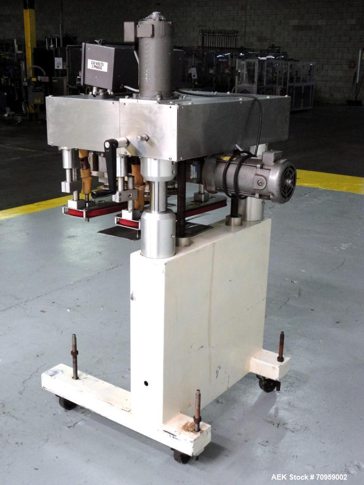 Used Kaps-All Model F4 Inline Quill Cap Tightener or Retorquer. Capable of speeds over 150 BPM. Cap size range: 13 to 70 mm. Has single belt side grippers 25" long x 7/8" tall, C-frame design with pa...