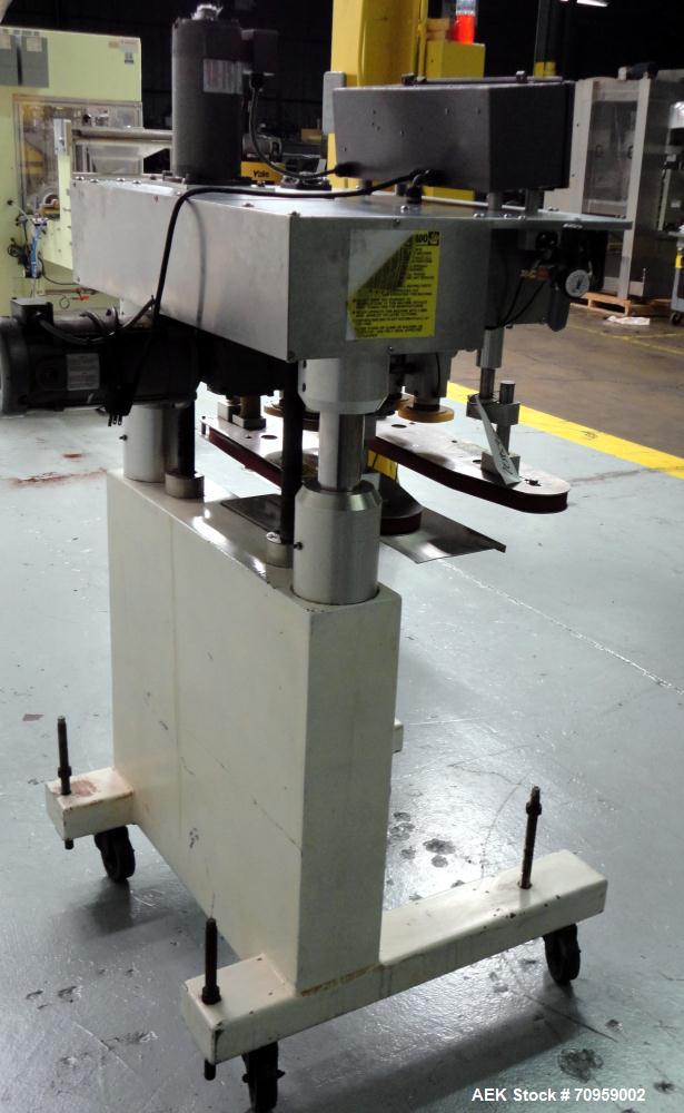 Used Kaps-All Model F4 Inline Quill Cap Tightener or Retorquer. Capable of speeds over 150 BPM. Cap size range: 13 to 70 mm. Has single belt side grippers 25" long x 7/8" tall, C-frame design with pa...