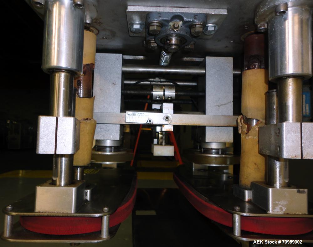 Used Kaps-All Model F4 Inline Quill Cap Tightener or Retorquer. Capable of speeds over 150 BPM. Cap size range: 13 to 70 mm. Has single belt side grippers 25" long x 7/8" tall, C-frame design with pa...
