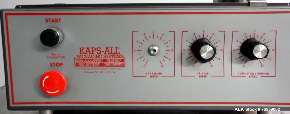 Used Kaps-All Model F4 Inline Quill Cap Tightener or Retorquer. Capable of speeds over 150 BPM. Cap size range: 13 to 70 mm. Has single belt side grippers 25" long x 7/8" tall, C-frame design with pa...
