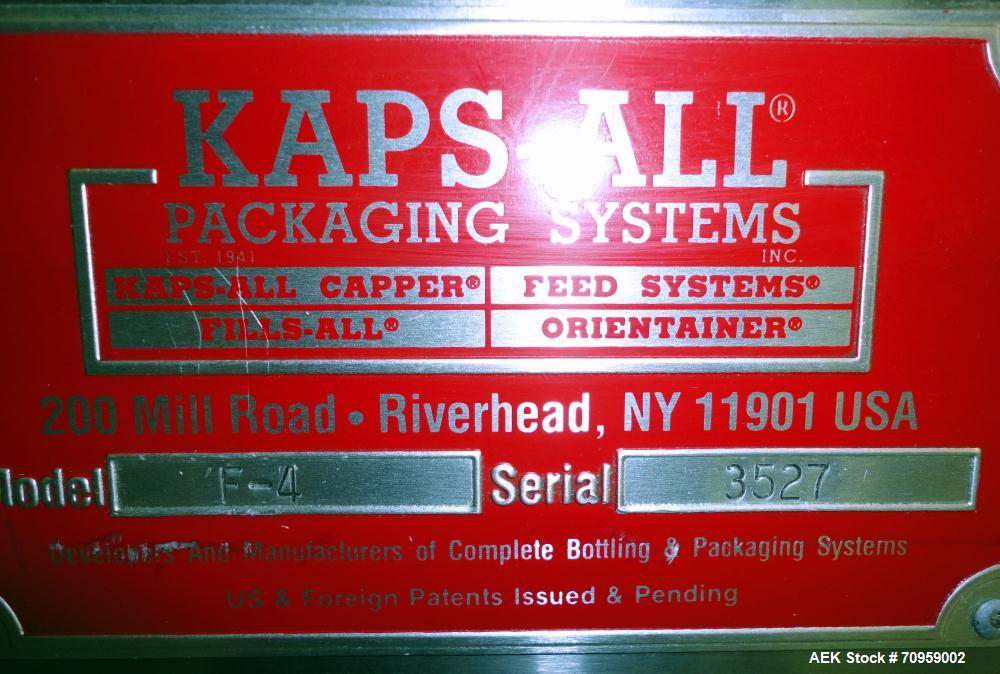 Used Kaps-All Model F4 Inline Quill Cap Tightener or Retorquer. Capable of speeds over 150 BPM. Cap size range: 13 to 70 mm. Has single belt side grippers 25" long x 7/8" tall, C-frame design with pa...