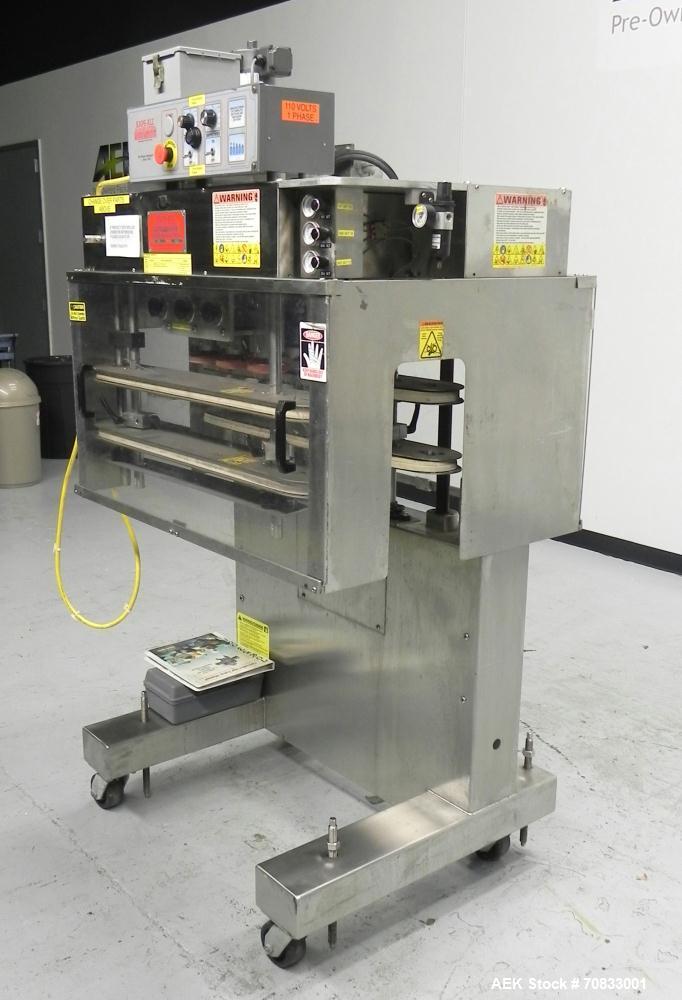 Used Kaps-All Model FA6 Industrial 6-Spindle Cap Retorquer. Machine is capable of speeds from 20 to 200 bottles per minute. Can handle caps of all materials from 8mm to 70mm (diameter). Can do pilfer...
