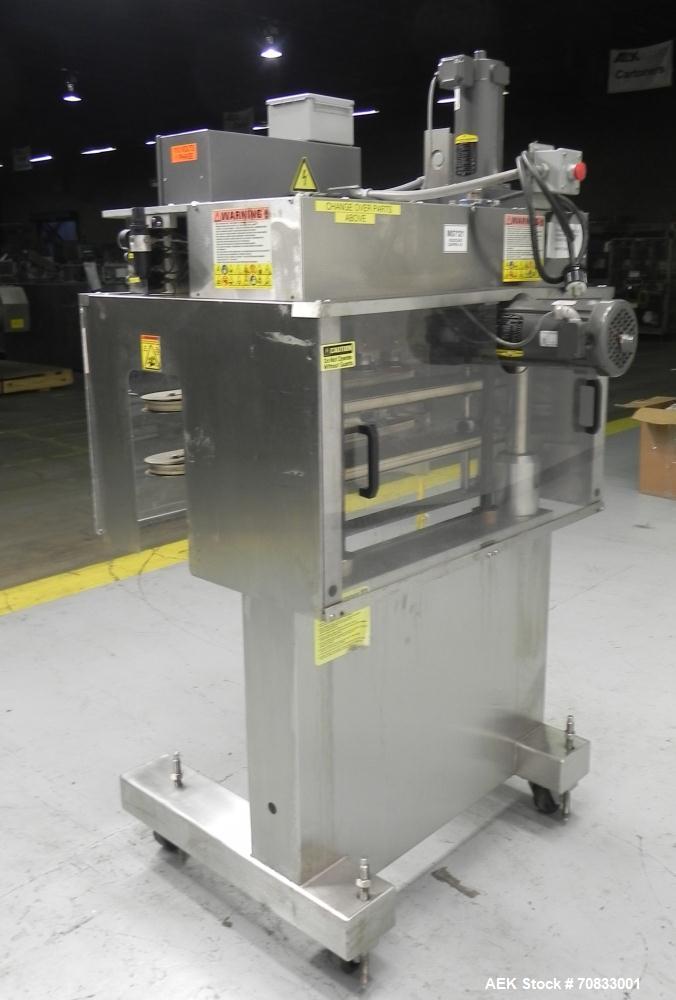 Used Kaps-All Model FA6 Industrial 6-Spindle Cap Retorquer. Machine is capable of speeds from 20 to 200 bottles per minute. Can handle caps of all materials from 8mm to 70mm (diameter). Can do pilfer...