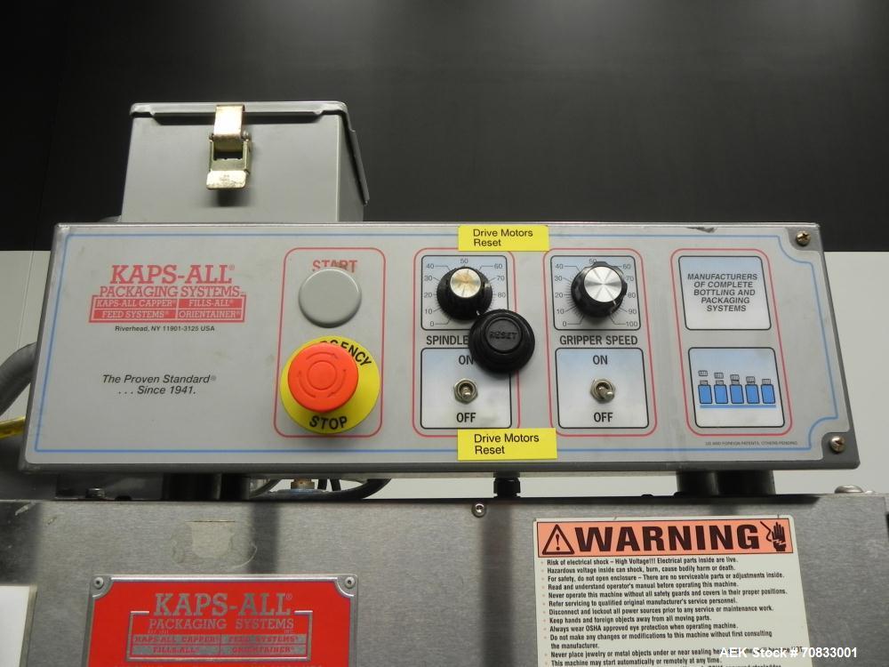 Used Kaps-All Model FA6 Industrial 6-Spindle Cap Retorquer. Machine is capable of speeds from 20 to 200 bottles per minute. Can handle caps of all materials from 8mm to 70mm (diameter). Can do pilfer...