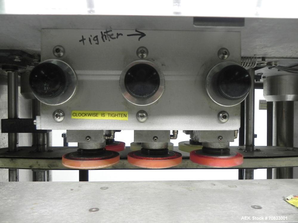 Used Kaps-All Model FA6 Industrial 6-Spindle Cap Retorquer. Machine is capable of speeds from 20 to 200 bottles per minute. Can handle caps of all materials from 8mm to 70mm (diameter). Can do pilfer...