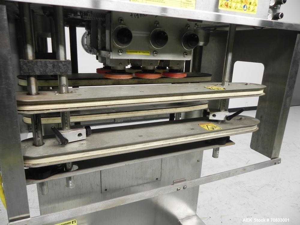Used Kaps-All Model FA6 Industrial 6-Spindle Cap Retorquer. Machine is capable of speeds from 20 to 200 bottles per minute. Can handle caps of all materials from 8mm to 70mm (diameter). Can do pilfer...