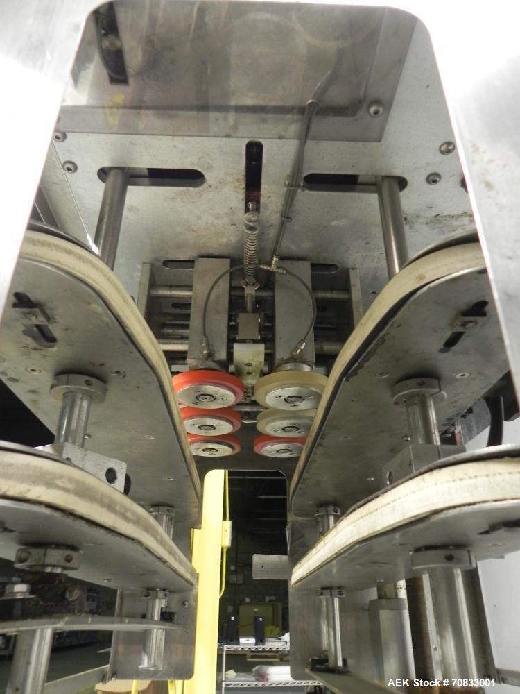 Used Kaps-All Model FA6 Industrial 6-Spindle Cap Retorquer. Machine is capable of speeds from 20 to 200 bottles per minute. Can handle caps of all materials from 8mm to 70mm (diameter). Can do pilfer...