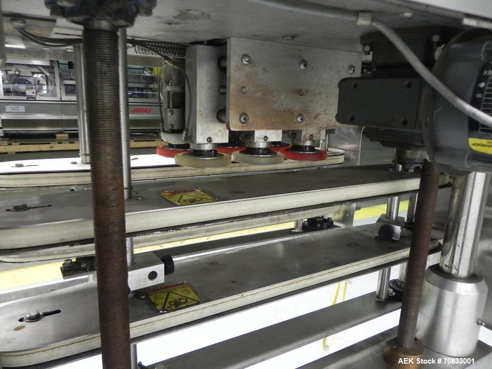 Used Kaps-All Model FA6 Industrial 6-Spindle Cap Retorquer. Machine is capable of speeds from 20 to 200 bottles per minute. Can handle caps of all materials from 8mm to 70mm (diameter). Can do pilfer...