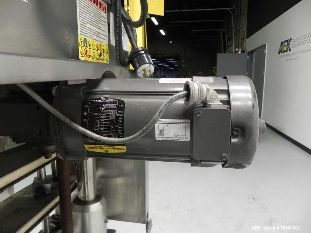 Used Kaps-All Model FA6 Industrial 6-Spindle Cap Retorquer. Machine is capable of speeds from 20 to 200 bottles per minute. Can handle caps of all materials from 8mm to 70mm (diameter). Can do pilfer...