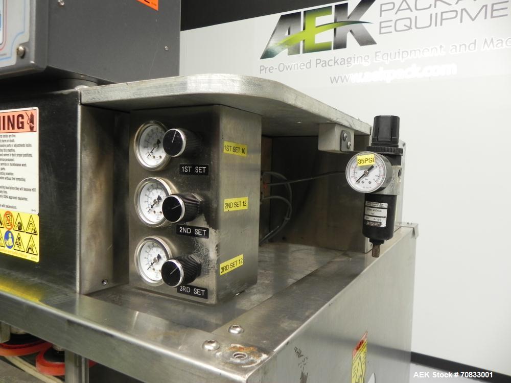 Used Kaps-All Model FA6 Industrial 6-Spindle Cap Retorquer. Machine is capable of speeds from 20 to 200 bottles per minute. Can handle caps of all materials from 8mm to 70mm (diameter). Can do pilfer...