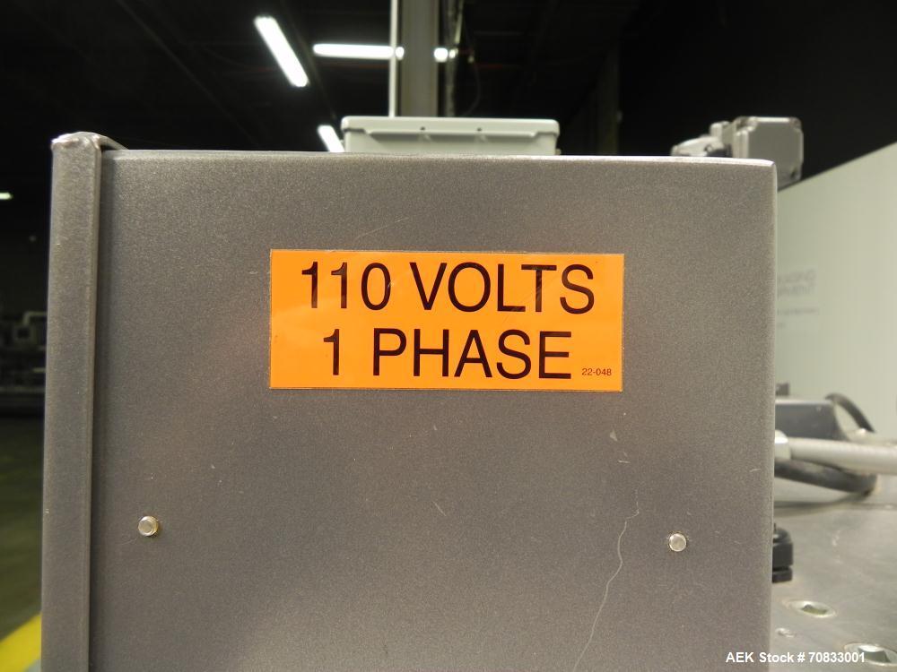 Used Kaps-All Model FA6 Industrial 6-Spindle Cap Retorquer. Machine is capable of speeds from 20 to 200 bottles per minute. Can handle caps of all materials from 8mm to 70mm (diameter). Can do pilfer...