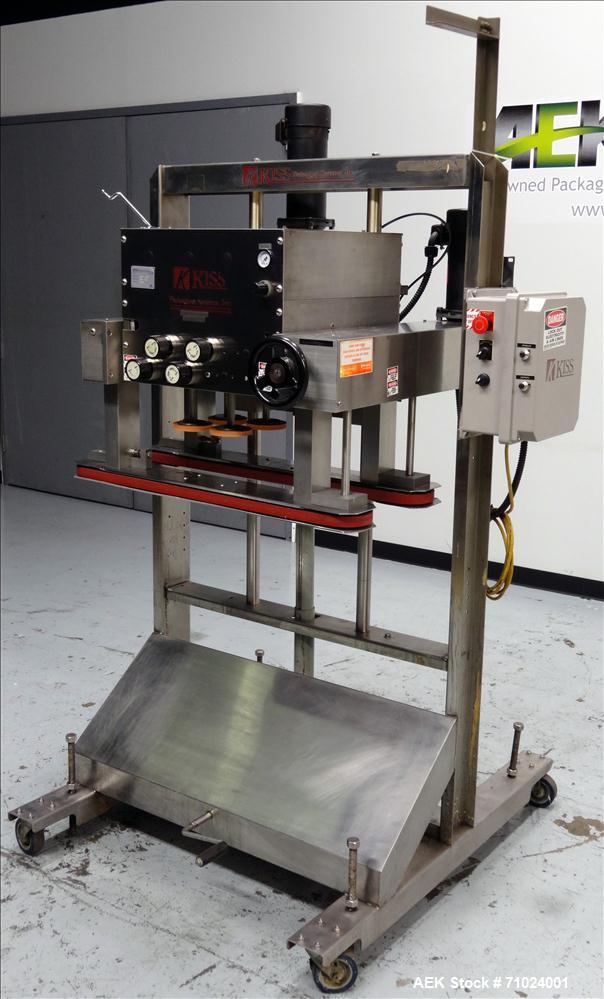 Used Kiss Packaging Model VCT-04 Automatic Cap Tightener/Retorquer. Capable of speeds over 100 containers per minute. Has an adjustable cap size range from 13mm - 110mm. Has 32" long single side belt...