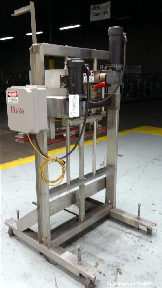 Used Kiss Packaging Model VCT-04 Automatic Cap Tightener/Retorquer. Capable of speeds over 100 containers per minute. Has an adjustable cap size range from 13mm - 110mm. Has 32" long single side belt...