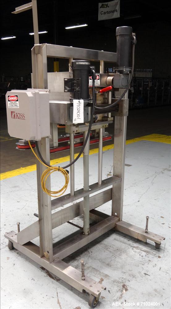 Used Kiss Packaging Model VCT-04 Automatic Cap Tightener/Retorquer. Capable of speeds over 100 containers per minute. Has an adjustable cap size range from 13mm - 110mm. Has 32" long single side belt...