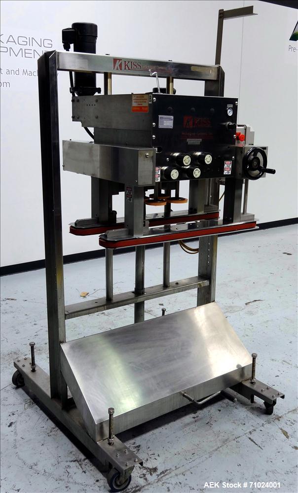 Used Kiss Packaging Model VCT-04 Automatic Cap Tightener/Retorquer. Capable of speeds over 100 containers per minute. Has an adjustable cap size range from 13mm - 110mm. Has 32" long single side belt...