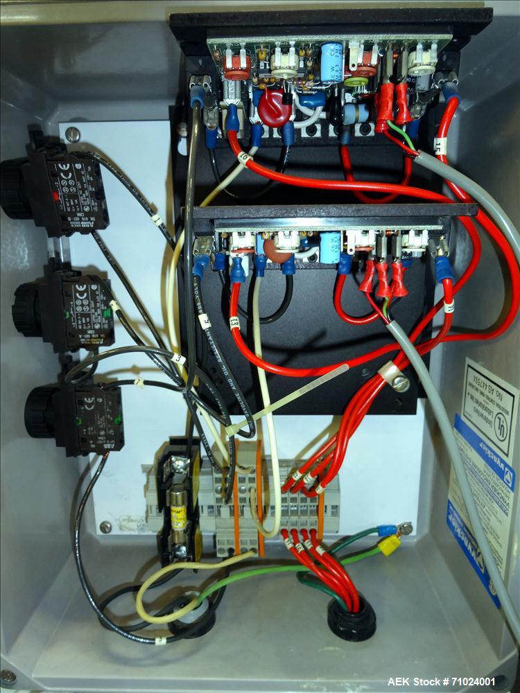 Used Kiss Packaging Model VCT-04 Automatic Cap Tightener/Retorquer. Capable of speeds over 100 containers per minute. Has an adjustable cap size range from 13mm - 110mm. Has 32" long single side belt...