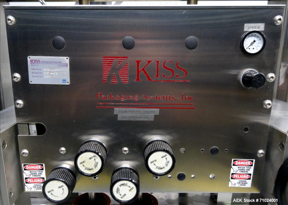 Used Kiss Packaging Model VCT-04 Automatic Cap Tightener/Retorquer. Capable of speeds over 100 containers per minute. Has an adjustable cap size range from 13mm - 110mm. Has 32" long single side belt...
