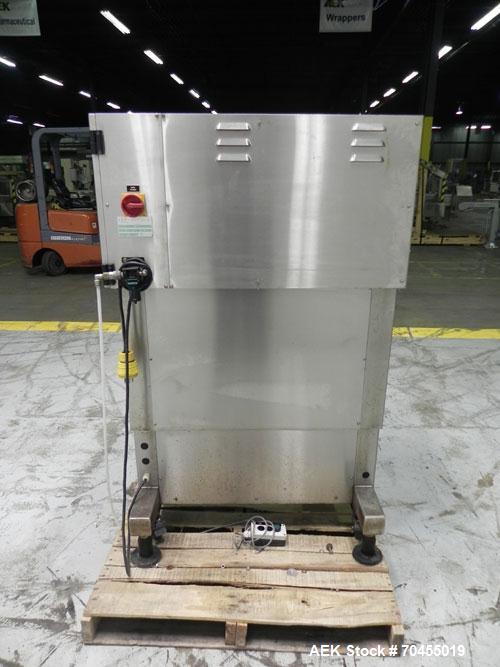Used New Jersey Machine Model RTQ-150 Cap Tightener and Retorquer. Capable of speeds up to 300 bottles per minute. Stainless steel frame, mounts over existing conveyor. Has single side gripper belts....