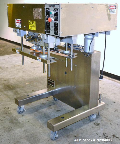 Used Healthstar Puretorque Cap Tightener & Retorquer, Model PT 500. Capable of speeds over 200 bottles per minute. Has six quills and single side belt grippers (double grip station can be added for t...