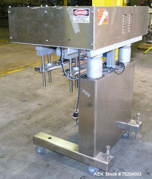Used Healthstar Puretorque Cap Tightener & Retorquer, Model PT 500. Capable of speeds over 200 bottles per minute. Has six quills and single side belt grippers (double grip station can be added for t...