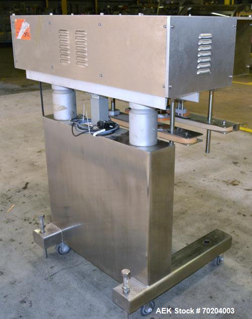 Used Healthstar Puretorque Cap Tightener & Retorquer, Model PT 500. Capable of speeds over 200 bottles per minute. Has six quills and single side belt grippers (double grip station can be added for t...