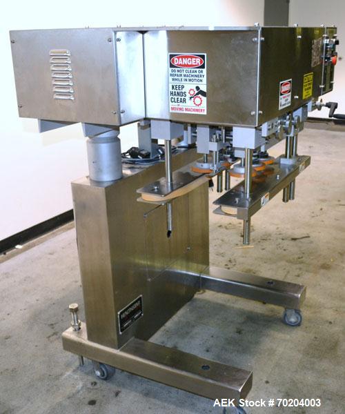 Used Healthstar Puretorque Cap Tightener & Retorquer, Model PT 500. Capable of speeds over 200 bottles per minute. Has six quills and single side belt grippers (double grip station can be added for t...