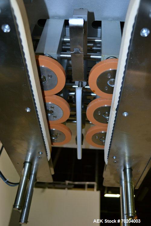 Used Healthstar Puretorque Cap Tightener & Retorquer, Model PT 500. Capable of speeds over 200 bottles per minute. Has six quills and single side belt grippers (double grip station can be added for t...