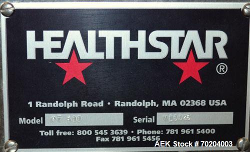Used Healthstar Puretorque Cap Tightener & Retorquer, Model PT 500. Capable of speeds over 200 bottles per minute. Has six quills and single side belt grippers (double grip station can be added for t...