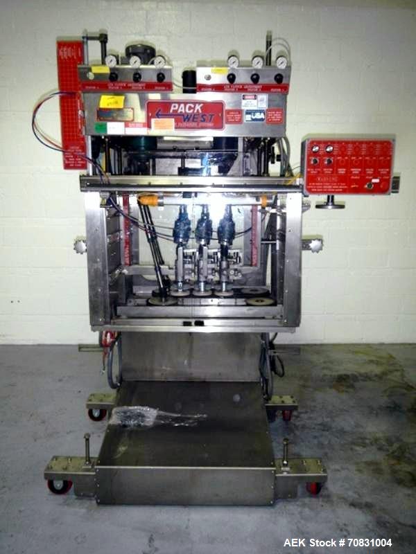 Used Pack West Auto Model AC-120 Cap Tightener & Retorquer. Capable of speeds up to 150 containers per minute. Cap size range: up to 53mm. All stainless steel frame. C frame design, mounts over exist...