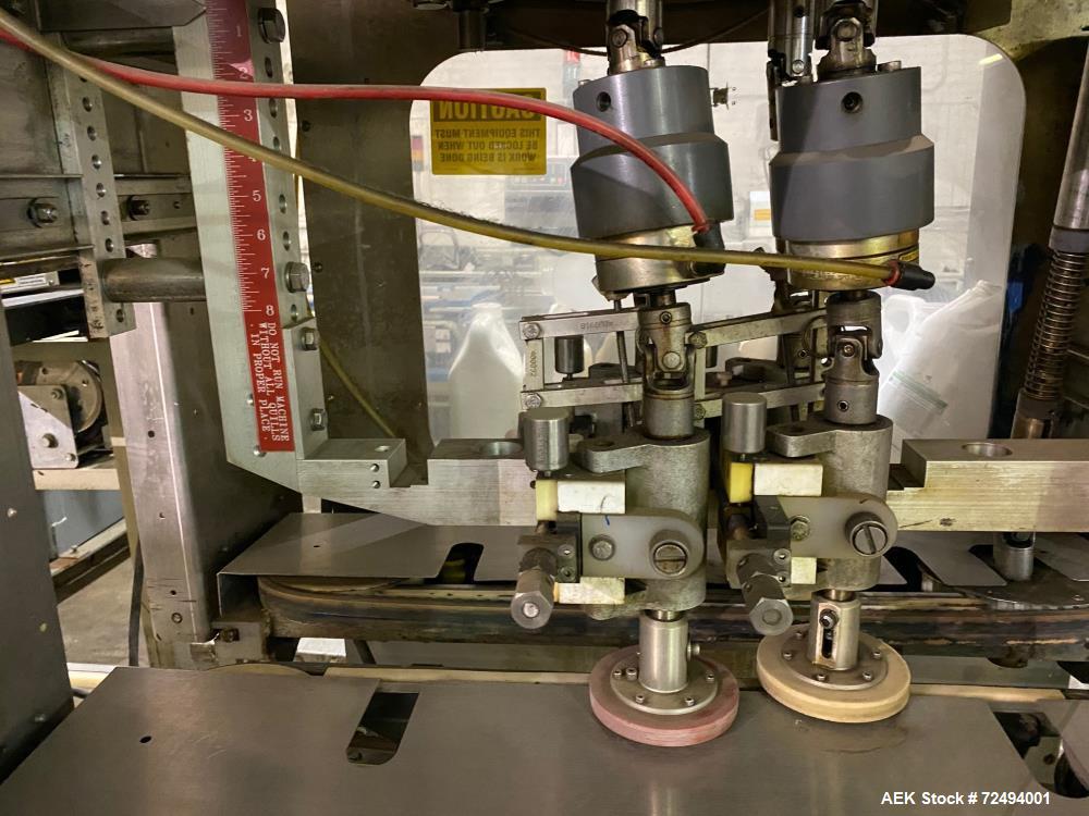 Used Pack West Model Auto 80 Two Station Four Quill Cap Tightener