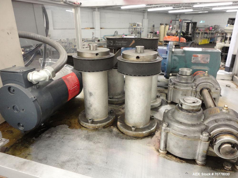 Used Resina Model RT-20 Cap Tightener Retorquer capable of speeds up to 90 bottles per minute. Cap size range: 13mm to 38mm. C frame design, has two sets of cap tightening wheels, single side belt gr...