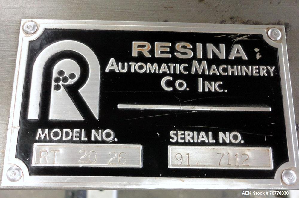 Used Resina Model RT-20 Cap Tightener Retorquer capable of speeds up to 90 bottles per minute. Cap size range: 13mm to 38mm. C frame design, has two sets of cap tightening wheels, single side belt gr...