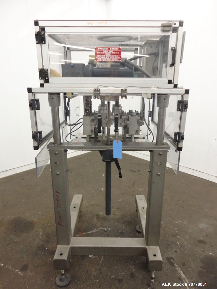 Used Resina Model RT-20 cap tightener retorquer. Capable of speeds up to 90 bottles per minute. Cap size range: 13mm to 38mm. C frame desing, has two sets of cap tightening wheel, single side belt gr...